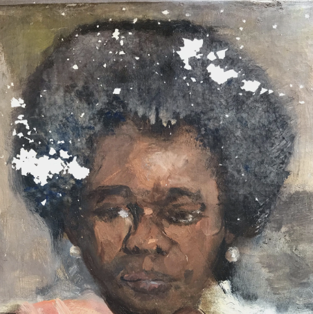 A painting of a woman's head during restoration treatment