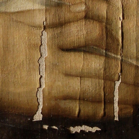 A close-up image of a painting that has paint flaking off